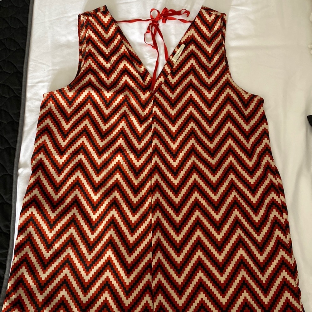 Size S Pleione blouse.
